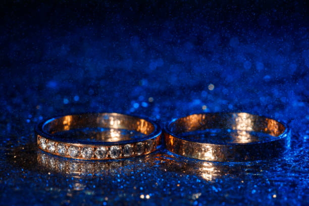 Beautiful wedding rings with blue neon lights