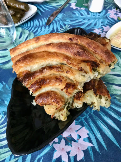 istock Delicious Balkan Meat Phyllo Pie Called Borek / Burek with Spinach. 1234747590