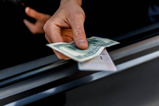 istock Close-up of a bribe on the road. 1234747946