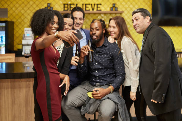 istock Multi-Ethnic Corporate Team Taking Selfie at Office Party 1234776232