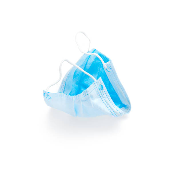 istock Used Blue medical mask top view isolated on white background 1234777816