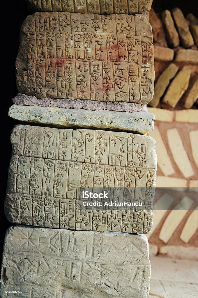 Ancient Sumerian writing This photograph represent natural stones with ancient Sumerian writing. Cuneiform Stock Photo