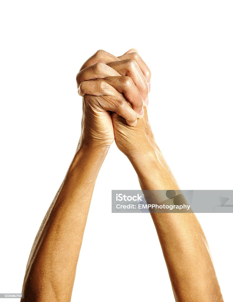 African American Clasping mani isolato su bianco - Foto stock royalty-free di Mani incrociate