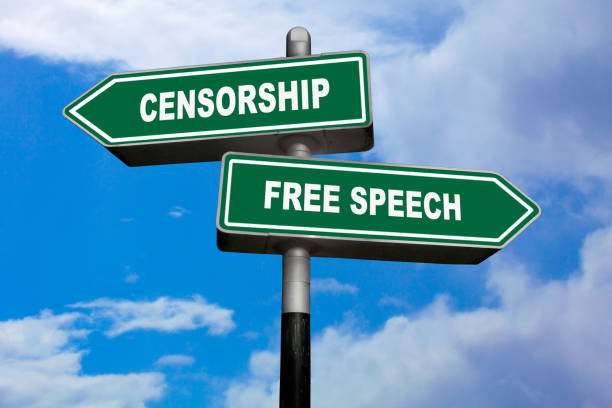 Censorship vs Free speech Two direction signs, one pointing left (Censorship) and the other one, pointing right (Free speech). censorship photos stock pictures, royalty-free photos & images