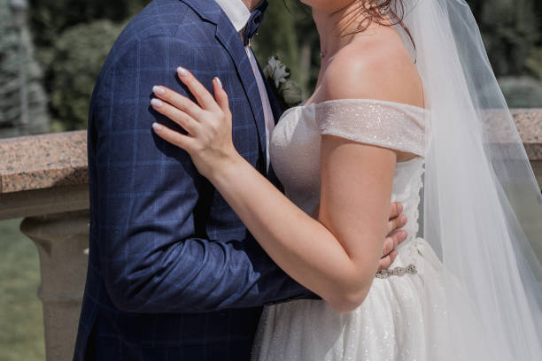 istock bride and groom in the park 1234885926