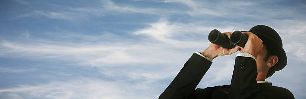 istock Businessman looking through binoculars XXL 123488781