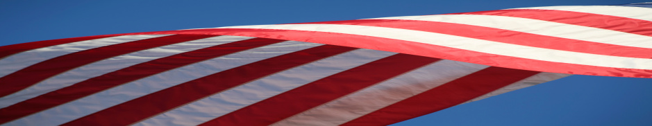 The American flag being raisedOther available American flag images: