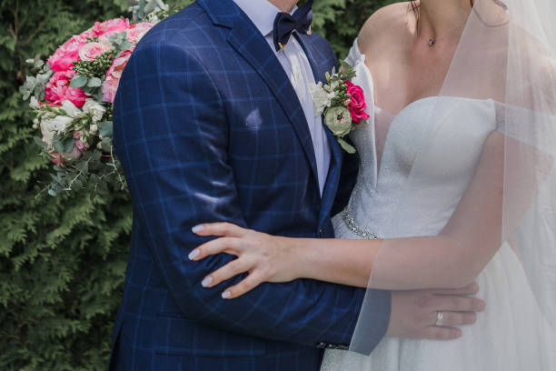 istock bride and groom in the park 1234905203