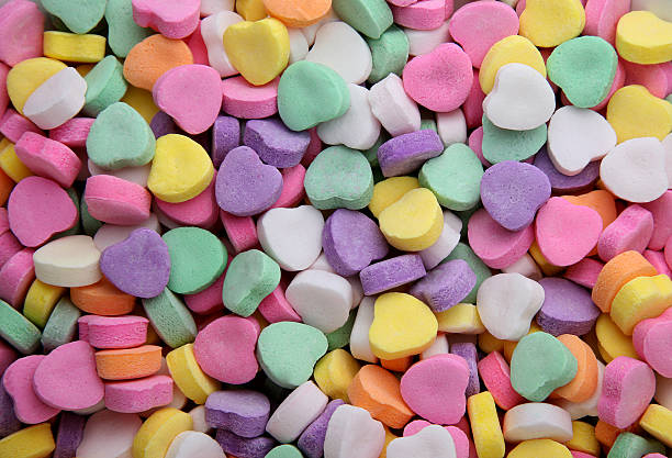 день святого валентина фон с сердечками - candy стоковые фото и изображения