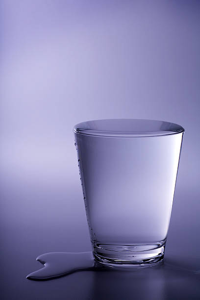 istock Overflowing Glass of Water 123492769