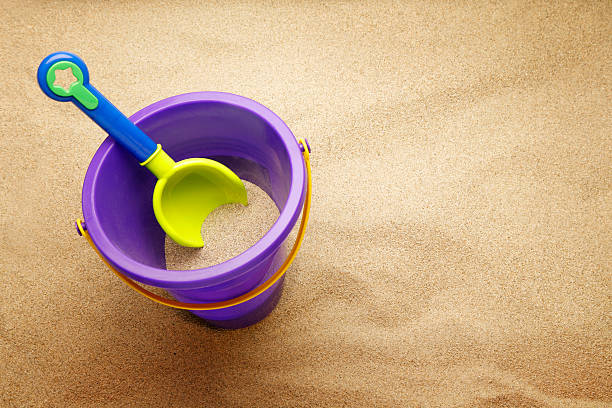 bucket and shovel in the sand  sandbox stock pictures, royalty-free photos & images