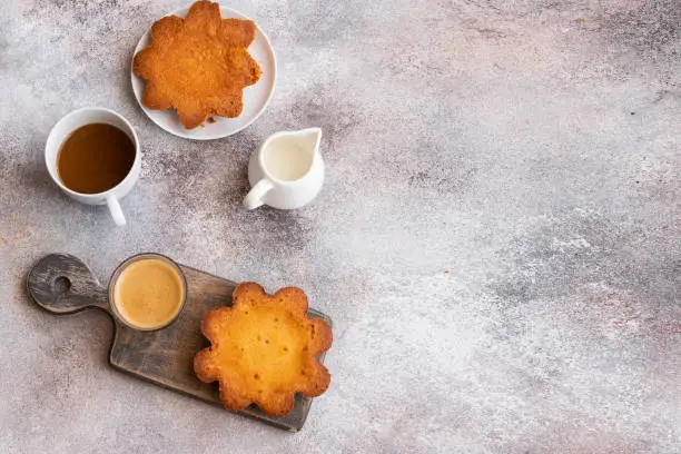 Photo of Quesadilla, Canary island  version of cheesecake  with cup of coffee on concrete background. Copy space.