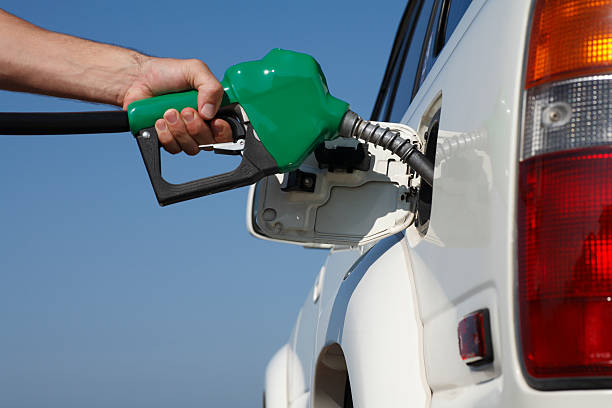 istock filling up the car with gas 123496102