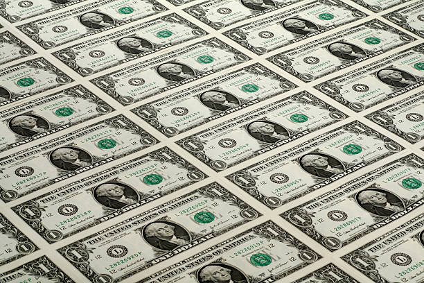 lots of one dollar bills wall of brand new one dollar bills. american one dollar bill photos stock pictures, royalty-free photos & images