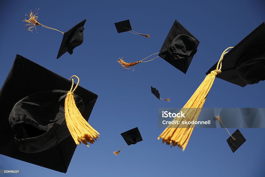 Graduation Caps Thrown in the Air  Graduation Stock Photo