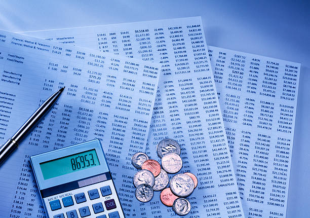 On color chart are coins and calculator with pen. Scaling business helps capture market and dictate terms that affect profit. On table are papers with graphs and charts. Financial report for client
