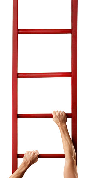 Two ladders are standing next to the door
