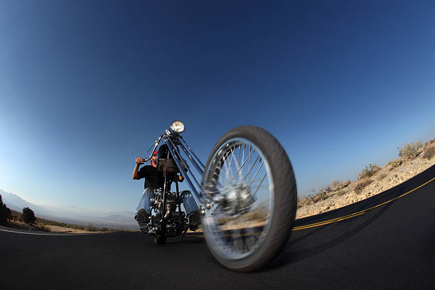 istock Riding a Chopper Motorcycle in the Desert 123500635