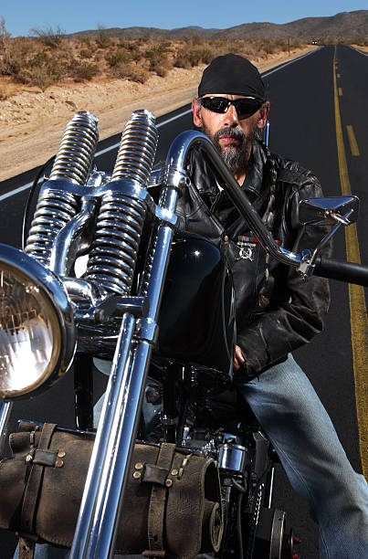 istock Portrait of Biker on the Road 123500681
