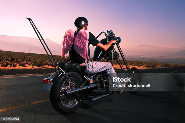 Photo libre de droit de Moto Motard Sur La Route Avec Des Ailes Dange banque d'images et plus d'images libres de droit de Moto - Moto, Motard, Vue de dos