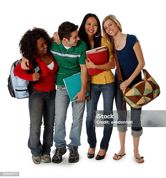 Cuatro Estudiantes Universitarios Sonriendo Sobre Blanco Foto de stock y más banco de imágenes de Fondo blanco