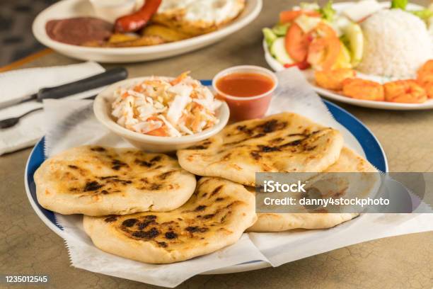 A Dish Of Pupusas And Others Mexican Food On The Table Stock Photo - Download Image Now