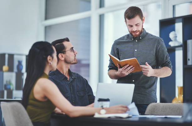 istock Guiding his team as the project manager 1235023030
