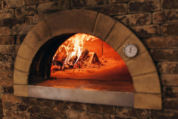 istock Fire wood burning in the oven, background. 1235055388