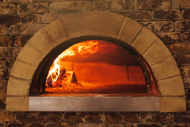 Fire wood burning in the oven, background.
