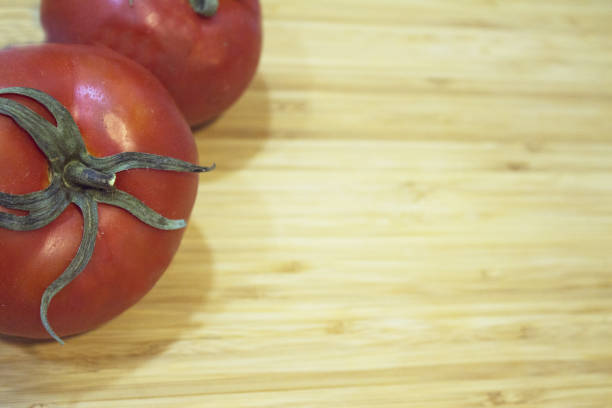 Bowl of red tomatoes on kitchen counter