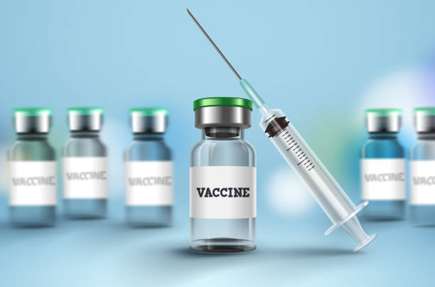 istock Vaccine and syringe vector background. Vaccine bottle and syringe injection for covid-19 coronavirus vaccination 1235129783