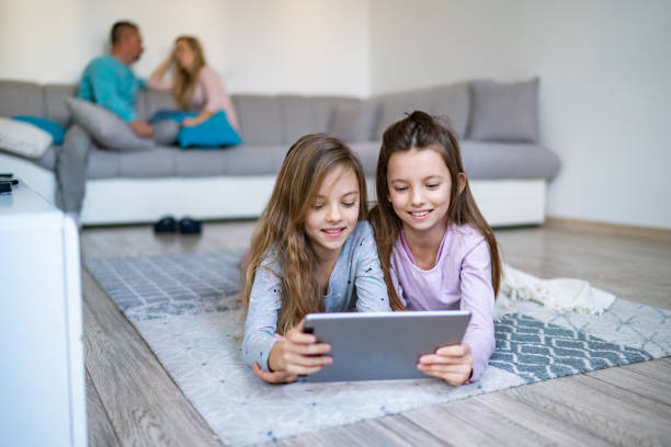 istock Girls have video call in home quarantine 1235163414