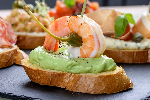 istock Bruschetta with shrimp and avocado puree 1235201792
