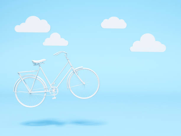 istock White bicycle floating on sky with Cloud shape decoration 3d rendering. 3d illustration ecological transport. Vintage bicycle on blue background. Relax, holiday template minimal Summer concept. 1235237446