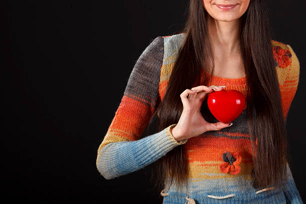 istock Female holding heart shape 123526479