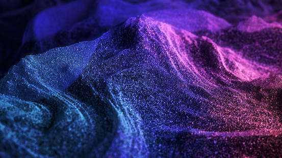 Abstract premium neon rainbow colored glitter pink, blue and purple particles flow with shallow depth of field dust. Magic shimmering festive party on a dark background. Little sparkles. 3d rendering