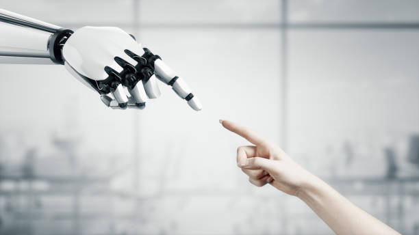 istock 3D Robot reaches out to the woman. Two hands in a proposal position. Artificial Intelligence. Business Design. Friendship between artificial and real people. Conceptual template. Symbol of the connect 1235304869
