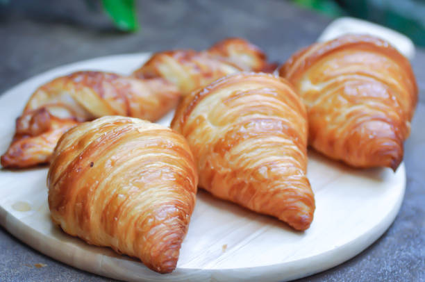 croissant, French croissants and bacon cheese twist croissant, French croissants and bacon cheese twist in the woooden board twisted bacon stock pictures, royalty-free photos & images