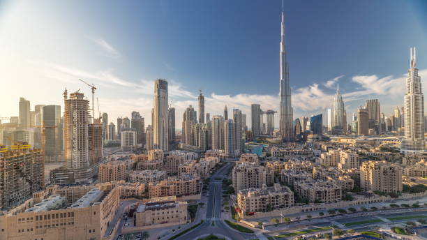 istock Dubai Downtown skyline timelapse with Burj Khalifa and other towers paniramic view from the top in Dubai 1235337551