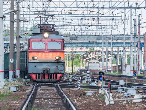 Freight train arrives to the station. Russia.