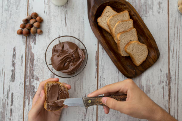 istock Bread toast with chocolate cream butter, 1235366268