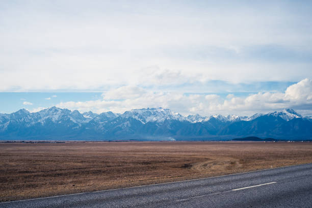 istock Landscape in the afternoon. Mountains with snowy peaks 1235406487