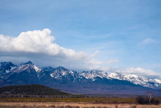 istock Landscape in the afternoon. Mountains with snowy peaks 1235407005