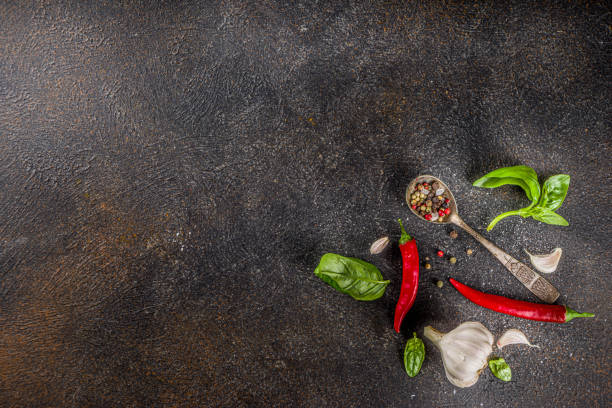 istock Assortment of spices, herbs and greens. 1235459289