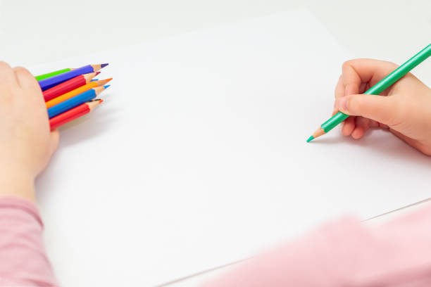istock Child is drawing by colored pencils. 1235525976