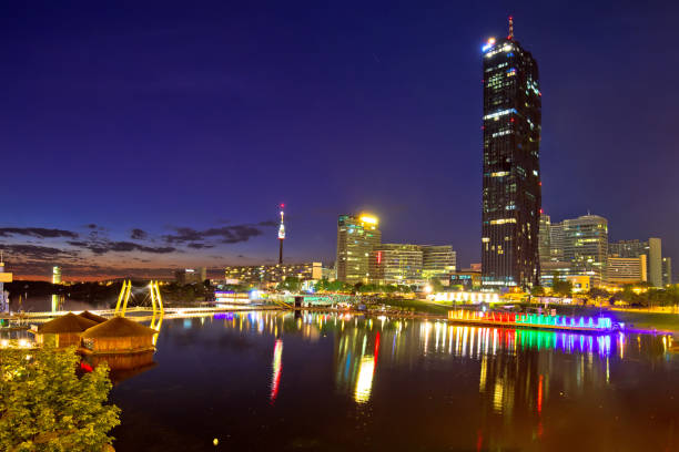 istock Vienna Donaustadt financial and bussines district and Danube river evening view 1235529659