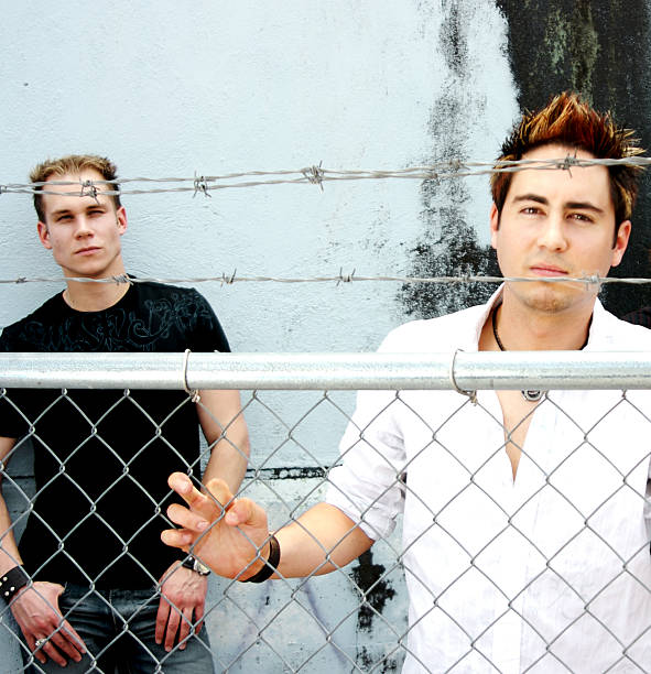 istock Men behind the fence 123554668