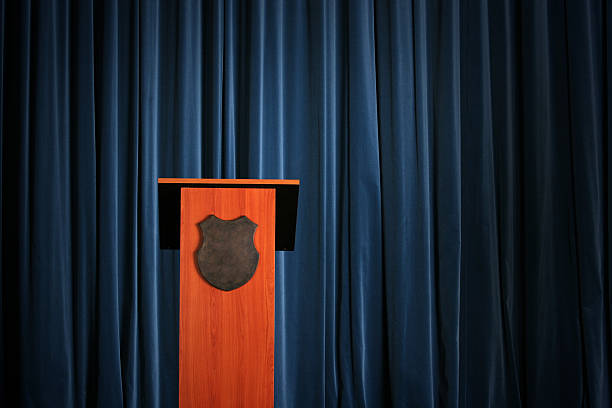 istock Empty press conference room with a wooden podium 123557500