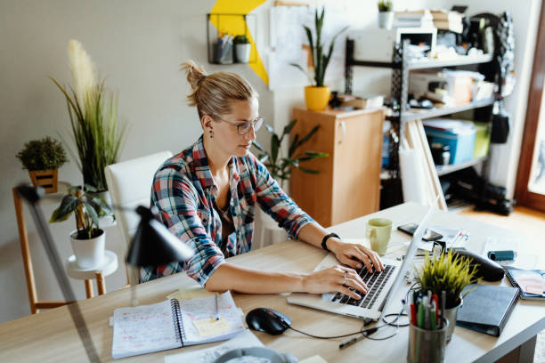 istock Woman developing new business while locked down during pandemic 1235602629