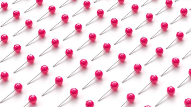 istock Many sweet pink lollipops arranged in rows on white background 1235615917